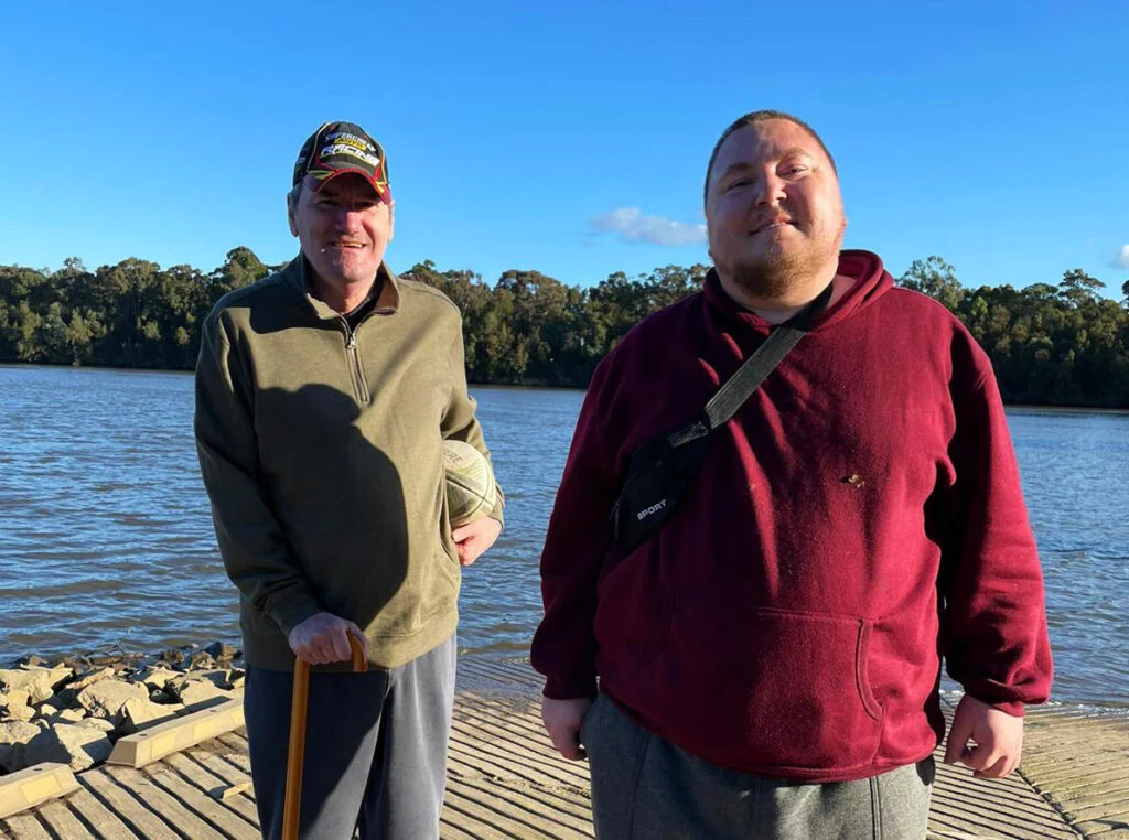 Two clients enjoying their time by the water
